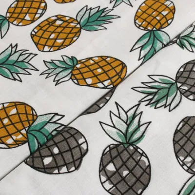 Venda quente respirável 100% poliéster tecido de impressão digital de desenho animado de abacaxi para calças de praia do Havaí